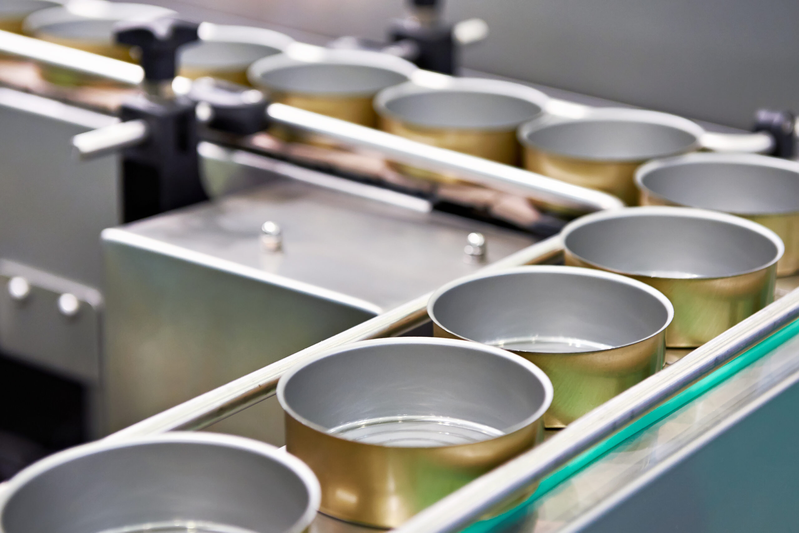 Empty,Cans,On,The,Conveyor,Of,A,Food,Factory